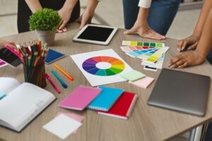 group of graphic designers checking on color swatch samples