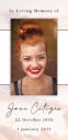 Memorial card with woman's smiling portrait.