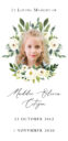 Memorial card with floral design and child's portrait.