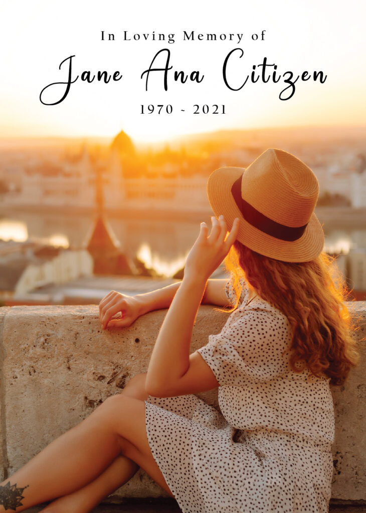 Woman in hat overlooking sunset cityscape