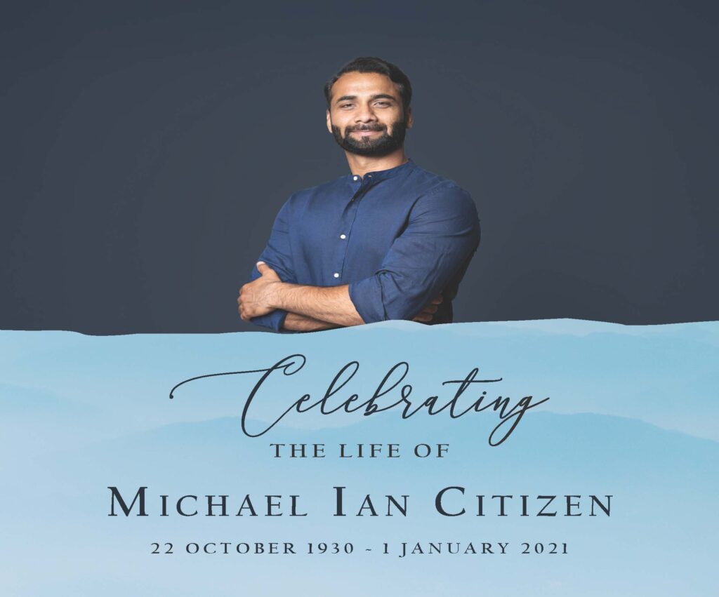 Memorial poster with smiling man in blue shirt.