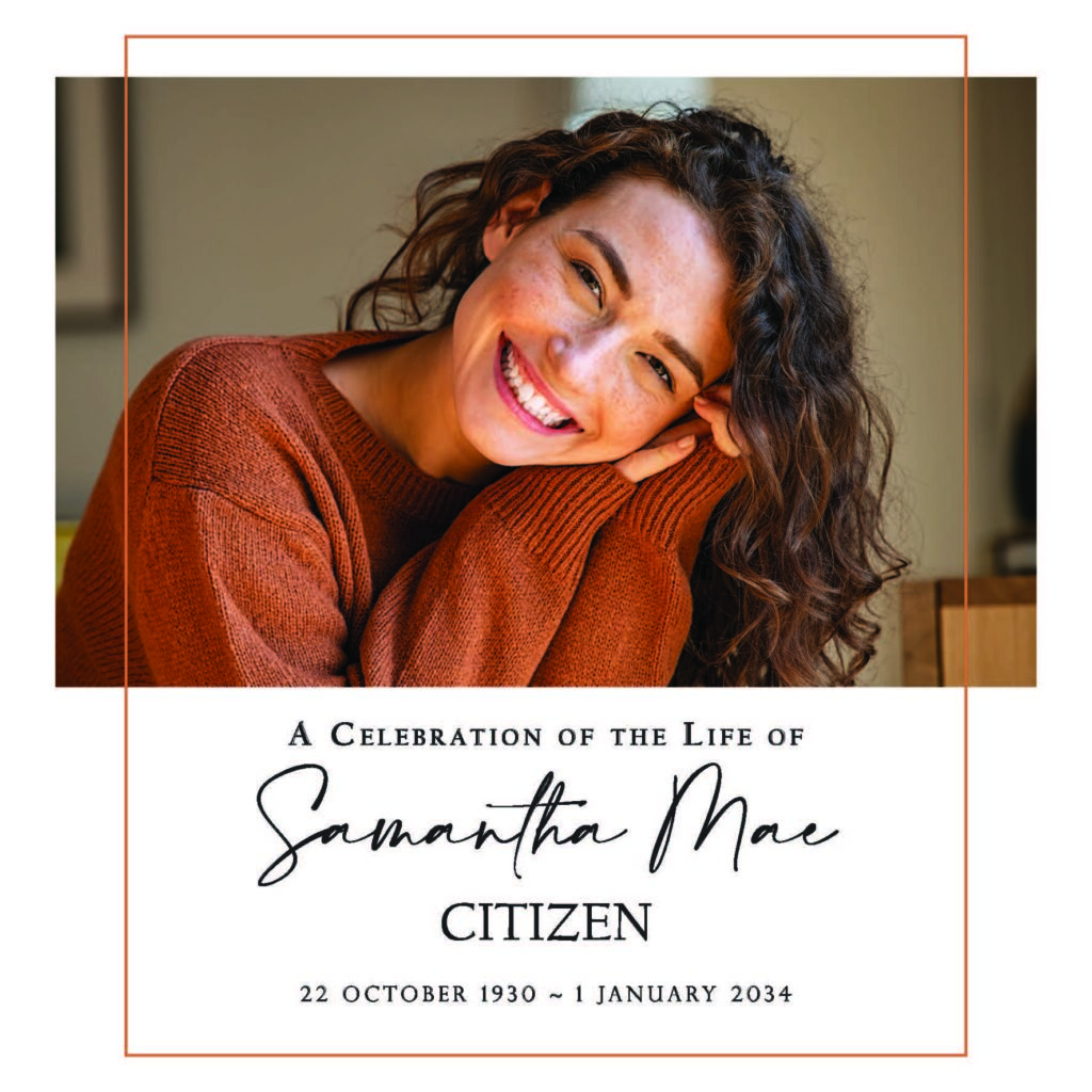 Portrait of smiling woman in brown sweater